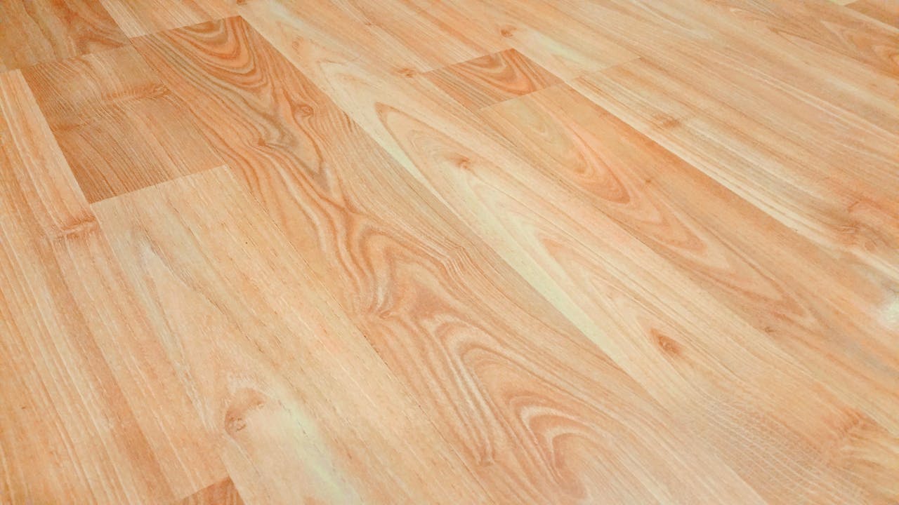 gallery-3 Detailed wooden floor texture background showcasing natural wood grain and patterns for design use.